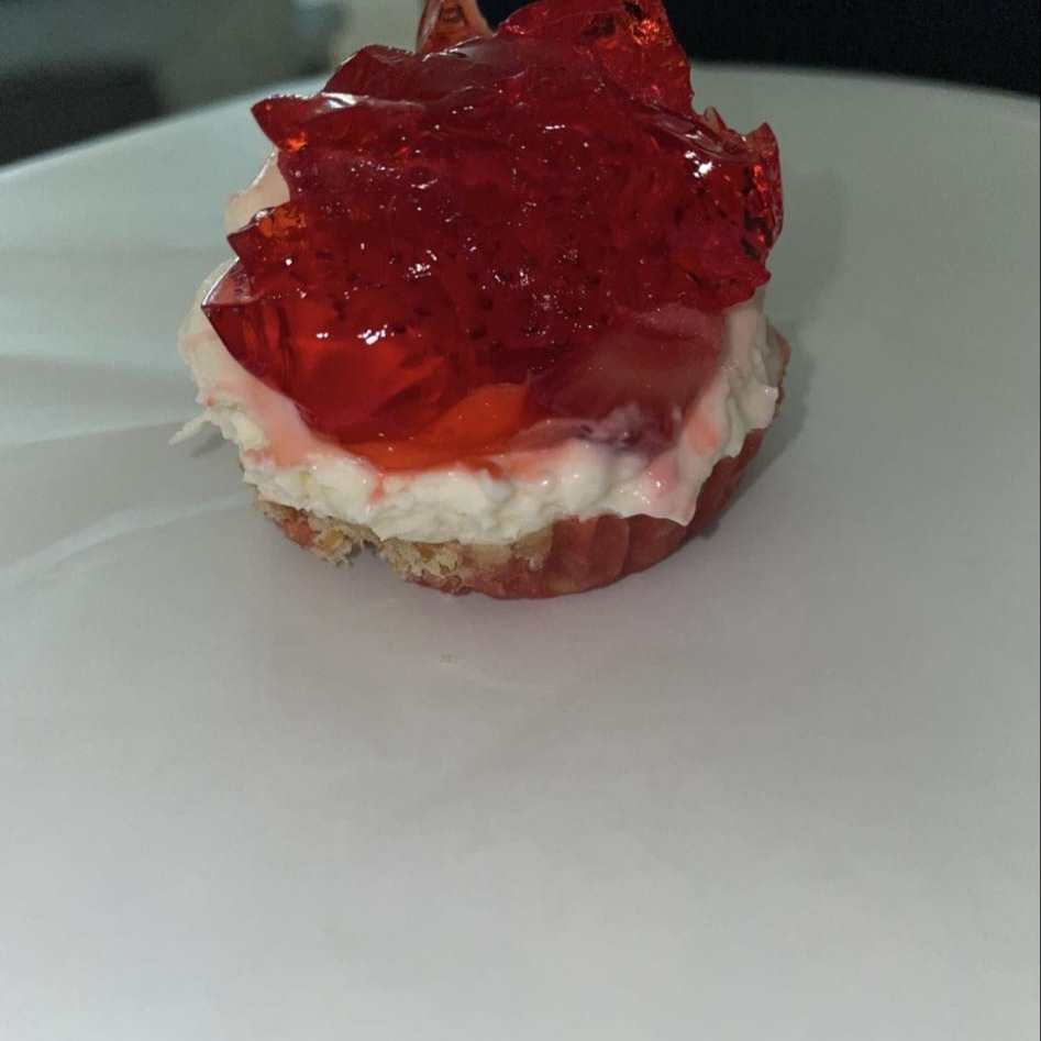 Cheesecake topped with strawberry gelatin