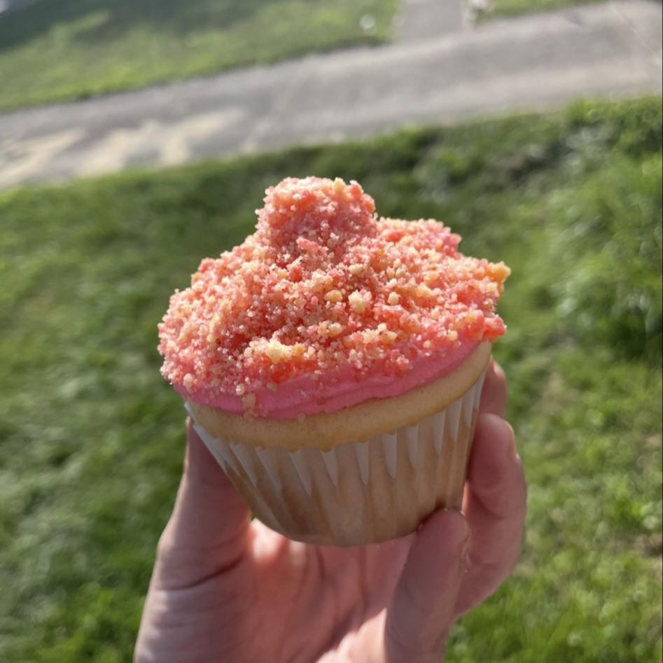 Pink frosting cupcake